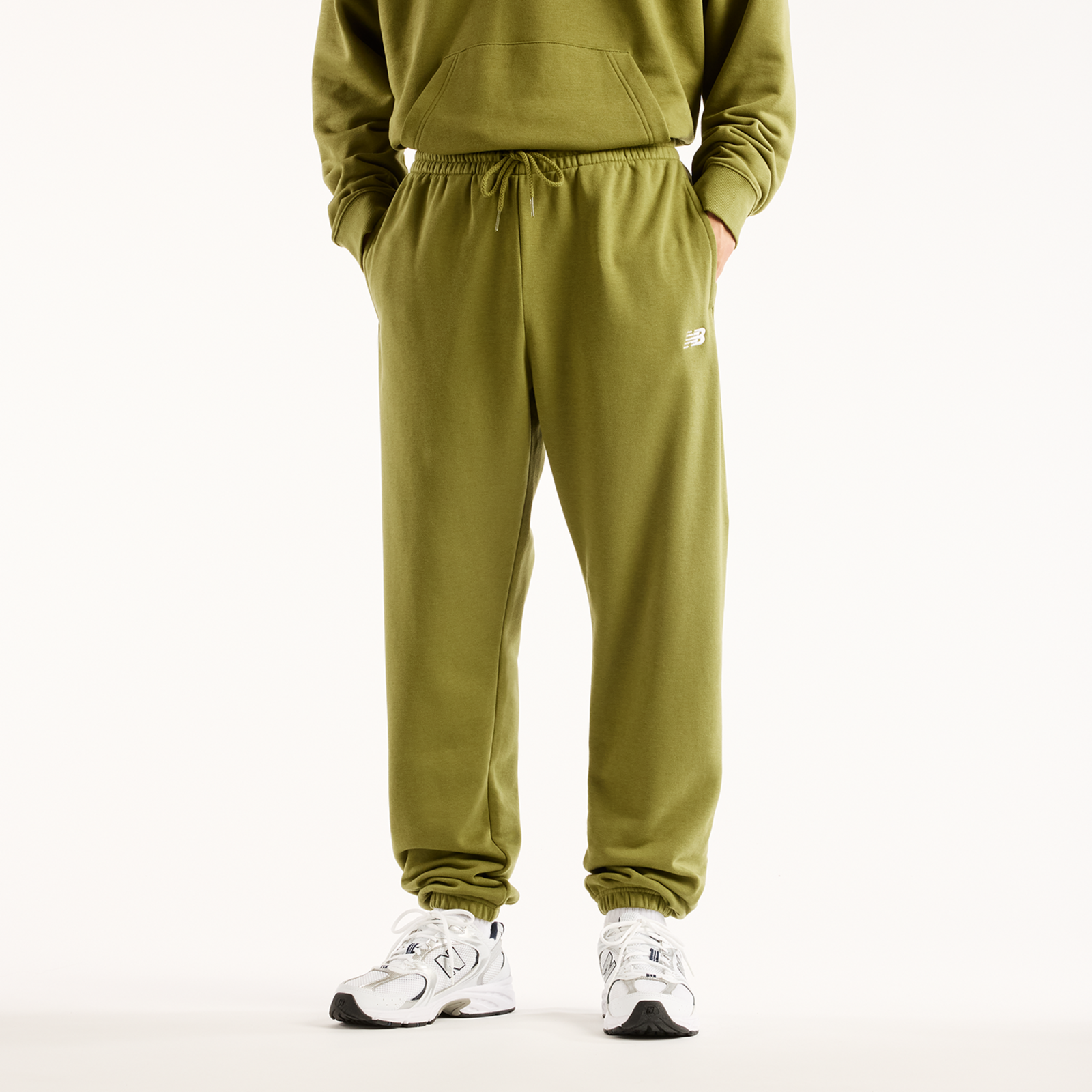 New Balance Sport Essentials French Terry Jogger Relaxed Fit Herren, grün, Grösse: S